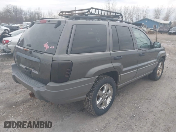 2002 Jeep Grand Cherokee Laredo with VIN 1J4GW48S92C294116, listed as a IAAI auction lot 42080375 with 154,108 mi miles and . Bid and sale history available at DreamBid. Image 4.