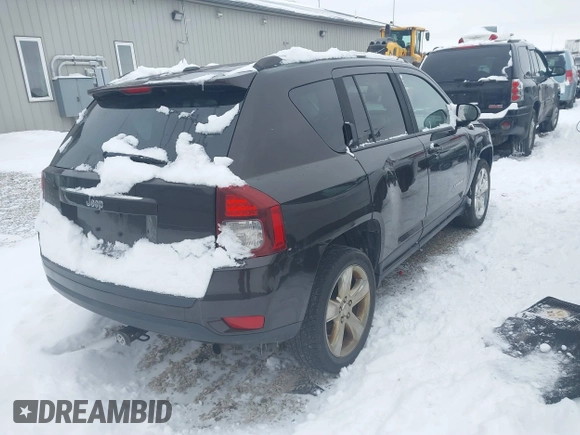 2014 Jeep Compass Latitude with VIN 1C4NJDEB1ED762578, listed as a IAAI auction lot 41244333 with 145,085 mi miles and . Bid and sale history available at carsss.com. Image 4.