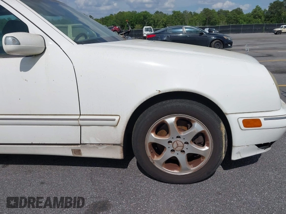 2002 Mercedes-Benz E-Class with VIN WDBJF65J22B432263, listed as a IAAI auction lot 42130545 with 220,852 mi miles. Bid and sale history available at carsss.com. Image 13.