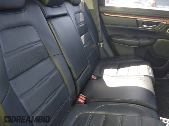 2020 Honda CR-V Touring with VIN 2HKRW2H98LH660573, listed as a IAAI auction lot 41524610 with 37,493 mi miles and . Bid and sale history available at DreamBid. Image 8.