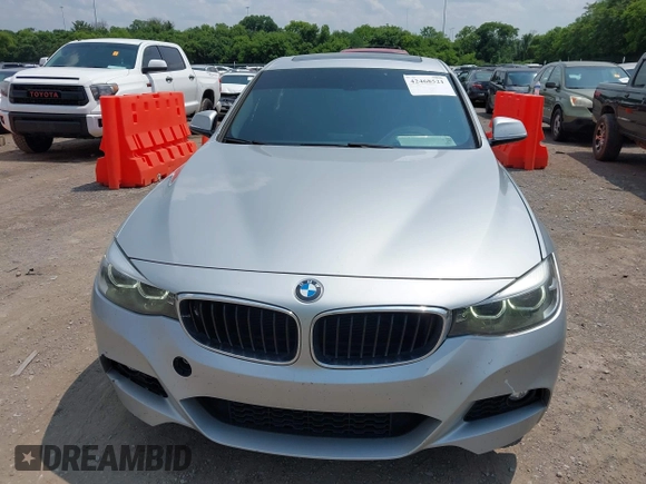 2018 BMW 3 Series 330i xDrive with VIN WBA8Z9C54JG828210, listed as a IAAI auction lot 42468521 with 72,741 mi miles and . Bid and sale history available at DreamBid. Image 12.