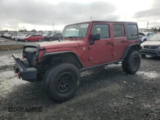 2012 Jeep Wrangler Unlimited Rubicon with VIN 1C4HJWFG2CL219021, listed as a Copart auction lot 87451784 with 109,675 mi miles and Salvage title. Bid and sale history available at DreamBid. Image 1.