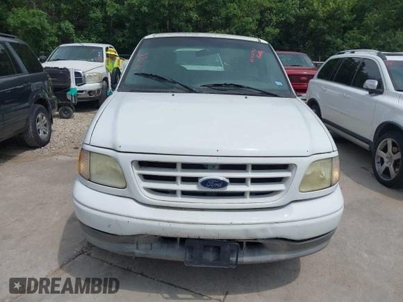 2003 Ford F-150 XL with VIN 1FTRX07263KD53880, listed as a IAAI auction lot 42422353 with 192,630 mi miles and . Bid and sale history available at DreamBid. Image 6.