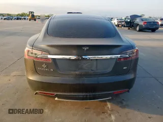 2013 Tesla Model S with VIN 5YJSA1CG0DFP15615, listed as a Copart auction lot 50795235 with 156,030 mi miles and Salvage title. Bid and sale history available at DreamBid. Image 6.