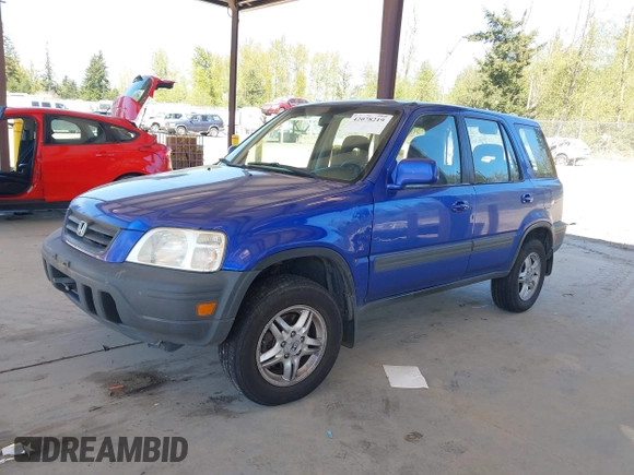 2001 Honda CR-V EX with VIN JHLRD18641C053166, listed as a IAAI auction lot 42078219 with 157,355 mi miles and . Bid and sale history available at DreamBid. Image 2.