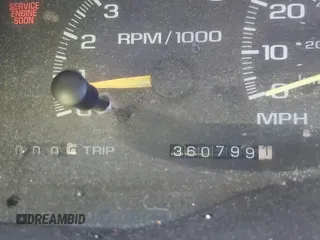 1999 GMC Suburban with VIN 1GKFK16RXXJ809823, listed as a IAAI auction lot 41687406 with 360,799 mi miles. Bid and sale history available at carsss.com. Image 7.