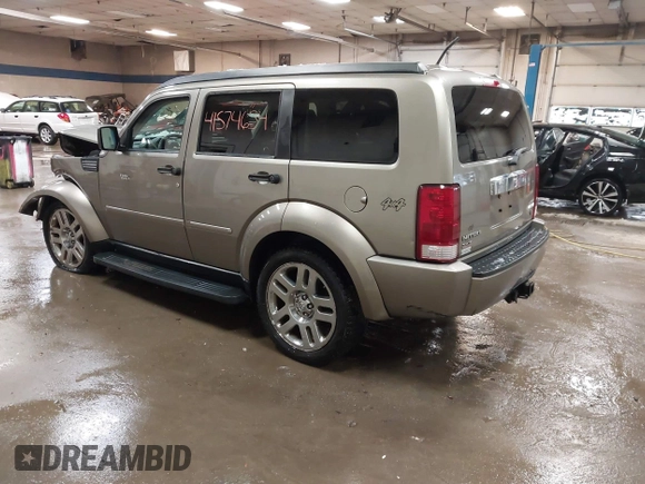 2007 Dodge Nitro SLT z VIN 1D8GU58K57W673543, wystawiony jako IAAI lot #41574634 z przebiegiem 64 286 mil mil oraz . Historia ofert i sprzedaży dostępna na DreamBid. Obrazek 3.