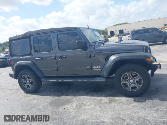 2018 Jeep Wrangler Unlimited Sport S z VIN 1C4HJXDGXJW165312, wystawiony jako IAAI lot #42095590 z przebiegiem 90 598 mil mil oraz . Historia ofert i sprzedaży dostępna na DreamBid. Obrazek 13.
