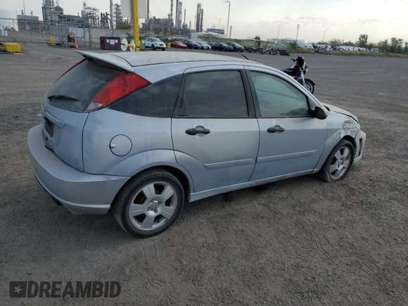 2007 Ford Focus S with VIN 1FAFP37N77W337626, listed as a Copart auction lot 70451294 with 174,068 mi miles and Salvage Title. Bid and sale history available at carsss.com. Image 3.