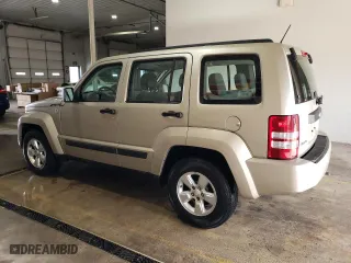 2010 Jeep Liberty Sport with VIN 1J4PN2GK9AW143878, listed as a Copart auction lot 52851095 with 121,357 mi miles and Salvage Title. Bid and sale history available at carsss.com. Image 2.