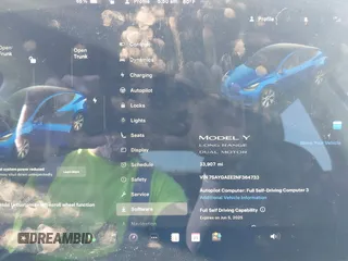 2022 Tesla Model Y Long Range z VIN 7SAYGAEE2NF364733, wystawiony jako IAAI lot #42290231 z przebiegiem 33 907 mil mil oraz . Historia ofert i sprzedaży dostępna na DreamBid. Obrazek 7.
