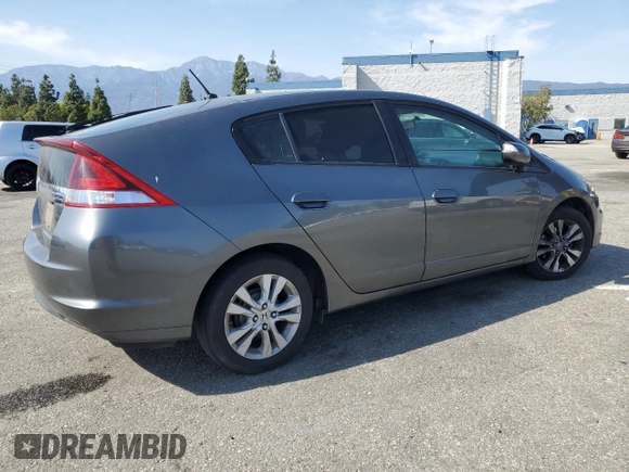 2012 Honda Insight EX z VIN JHMZE2H77CS002907, wystawiony jako Copart lot #52040465 z przebiegiem 158 266 mil mil oraz Szkoda całkowita • Salvage title. Historia ofert i sprzedaży dostępna na DreamBid. Obrazek 3.