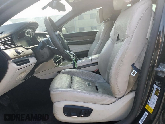 2014 BMW 7 Series 750i с VIN WBAYA8C57ED824970, выставлен на аукционе Copart как лот 61005925 с пробегом 144 457 миль миль и Чистый • Clean title. История ставок и продаж доступна на DreamBid. Изображение 7.