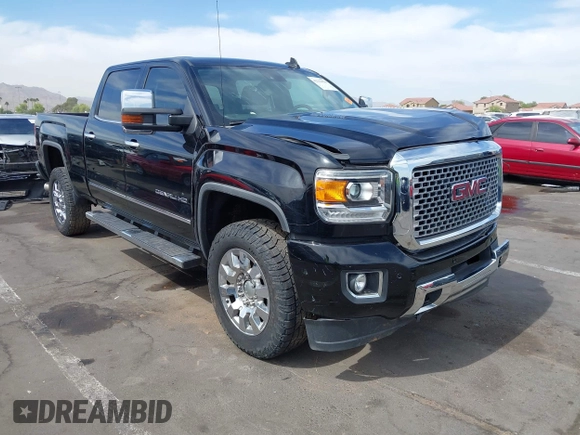 2015 GMC Sierra 2500HD Denali z VIN 1GT120E86FF667058, wystawiony jako IAAI lot #42212058 z przebiegiem 104 069 mil mil oraz . Historia ofert i sprzedaży dostępna na DreamBid. Obrazek 1.