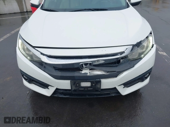 2016 Honda Civic Sedan EX-L with VIN 2HGFC1F78GH648639, listed as a IAAI auction lot 41895039 with 121,072 mi miles. Bid and sale history available at carsss.com. Image 12.