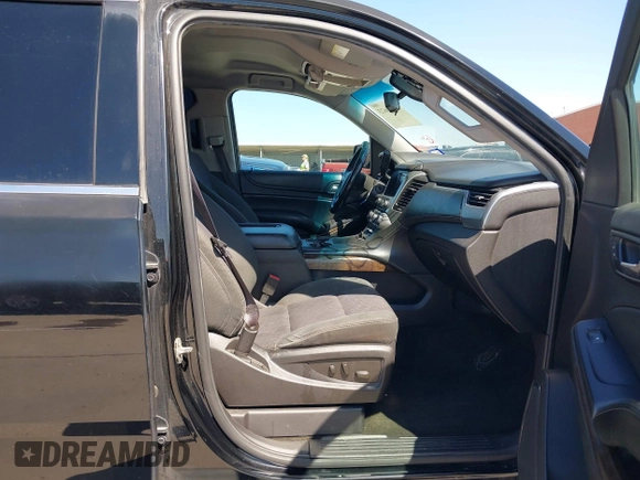 2015 Chevrolet Tahoe LS with VIN 1GNSCAKC5FR645736, listed as a IAAI auction lot 42064623 with 223,149 mi miles and . Bid and sale history available at DreamBid. Image 5.