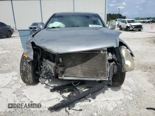 2004 Infiniti G35 w/Leather with VIN JNKCV51F94M717606, listed as a Copart auction lot 74712714 with 197,420 mi miles and Salvage Title. Bid and sale history available at DreamBid. Image 5.