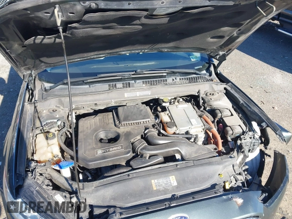2015 Ford Fusion S Hybrid with VIN 3FA6P0UU7FR117785, listed as a IAAI auction lot 41589546 with 136,657 mi miles. Bid and sale history available at carsss.com. Image 10.