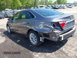 2016 Toyota Camry XLE with VIN 4T4BF1FK4GR557276, listed as a IAAI auction lot 42049650 with 117,529 mi miles and . Bid and sale history available at carsss.com. Image 3.