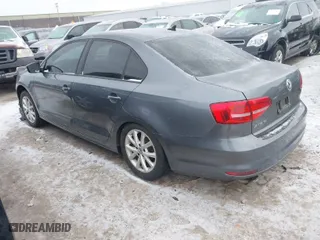 2015 Volkswagen Jetta Sedan 1.8T Sport with VIN 3VWD17AJ6FM319596, listed as a IAAI auction lot 41370591 with 92,818 mi miles. Bid and sale history available at carsss.com. Image 3.