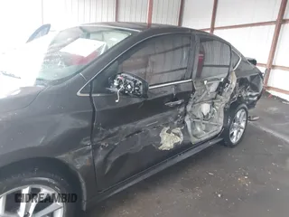 2015 Nissan Sentra SR with VIN 3N1AB7AP9FY347492, listed as a IAAI auction lot 41553625 with 206,010 mi miles and . Bid and sale history available at DreamBid. Image 6.