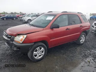 2006 Kia Sportage LX with VIN KNDJE723167159809, listed as a IAAI auction lot 41974464 with 130,822 mi miles and . Bid and sale history available at DreamBid. Image 2.