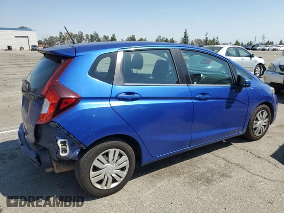 2015 Honda Fit LX with VIN 3HGGK5H53FM718378, listed as a Copart auction lot 52035245 with 104,786 mi miles and Salvage Title. Bid and sale history available at carsss.com. Image 3.