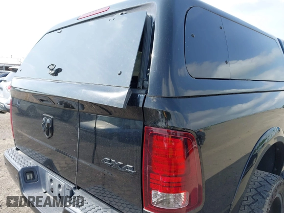 2015 Ram 2500 Laramie with VIN 3C6UR5FL0FG655552, listed as a IAAI auction lot 42456897 with 143,885 mi miles and . Bid and sale history available at DreamBid. Image 14.
