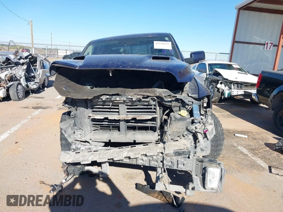 2014 Ram 1500 Sport z VIN 1C6RR6MT3ES366719, wystawiony jako IAAI lot #42228139 z przebiegiem Nie podano mil oraz . Historia ofert i sprzedaży dostępna na DreamBid. Obrazek 12.