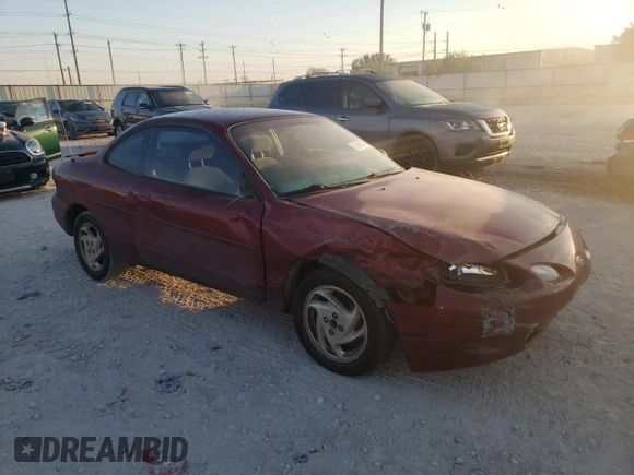 1998 Ford Escort ZX2 Cool z VIN 3FAKP1130WR260321, wystawiony jako Copart lot #73996074 z przebiegiem 62 842 mil mil oraz Szkoda całkowita • Salvage title. Historia ofert i sprzedaży dostępna na DreamBid. Obrazek 4.
