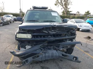 2004 Chevrolet Tahoe LS with VIN 1GNEK13T64R265302, listed as a IAAI auction lot 41445237 with 242,840 mi miles. Bid and sale history available at carsss.com. Image 12.