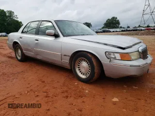 1999 Mercury Grand Marquis LS z VIN 2MEFM75W3XX617388, wystawiony jako Copart lot #58811195 z przebiegiem 162 600 mil mil oraz Szkoda całkowita • Salvage title. Historia ofert i sprzedaży dostępna na DreamBid. Obrazek 4.