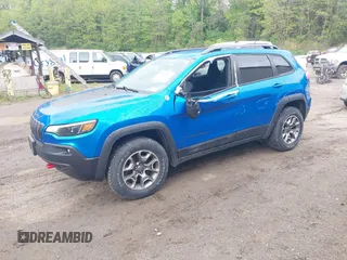 2021 Jeep Cherokee Trailhawk with VIN 1C4PJMBXXMD173102, listed as a IAAI auction lot 42205402 with 57,321 mi miles and . Bid and sale history available at DreamBid. Image 23.