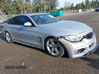 2016 BMW 4 Series 428i xDrive with VIN WBA4C9C5XGG135893, listed as a IAAI auction lot 41976541 with 86,987 mi miles and . Bid and sale history available at carsss.com. Image 1.