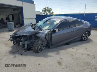 2016 Honda Civic EX-T z VIN 2HGFC3B33GH359702, wystawiony jako Copart lot #54943425 z przebiegiem Nie podano mil oraz Szkoda całkowita • Salvage title. Historia ofert i sprzedaży dostępna na DreamBid. Obrazek 1.