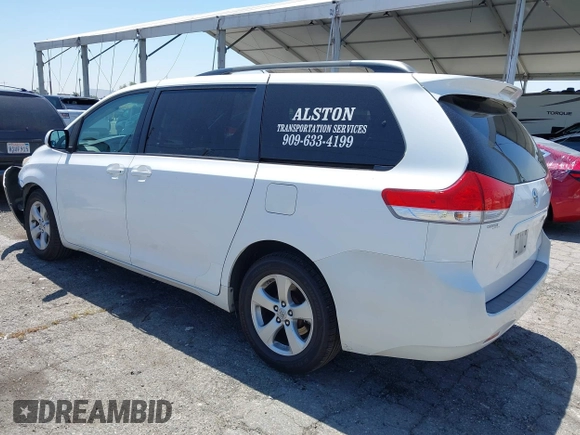 2011 Toyota Sienna LE AAS with VIN 5TDKK3DC3BS164612, listed as a IAAI auction lot 42302123 with 165,941 mi miles and . Bid and sale history available at DreamBid. Image 3.