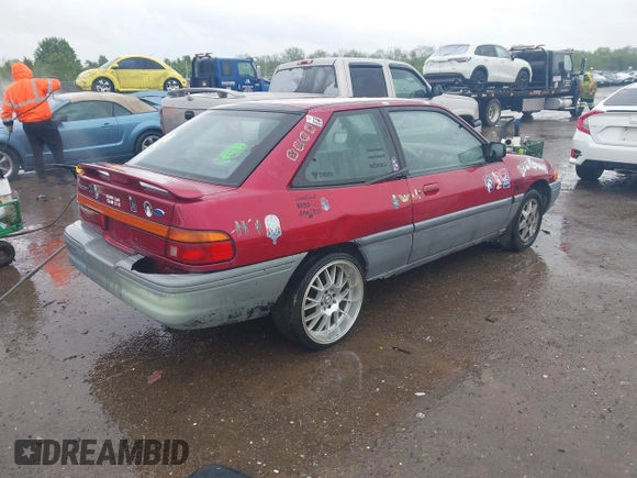 1995 Ford Escort z VIN 1FASP11J5SW107553, wystawiony jako IAAI lot #42202877 z przebiegiem 76 751 mil mil oraz . Historia ofert i sprzedaży dostępna na DreamBid. Obrazek 4.