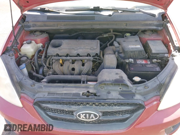 2008 Kia Rondo EX with VIN KNAFG525387174835, listed as a IAAI auction lot 42011406 with 138,656 mi miles. Bid and sale history available at carsss.com. Image 10.