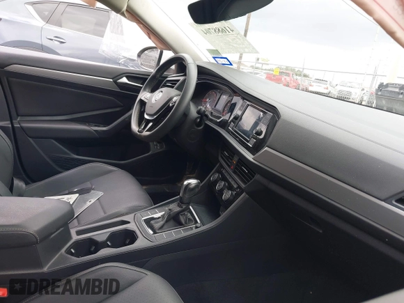 2021 Volkswagen Jetta S z VIN 3VWC57BU0MM085171, wystawiony jako IAAI lot #41688704 z przebiegiem 38 856 mil mil oraz . Historia ofert i sprzedaży dostępna na DreamBid. Obrazek 5.