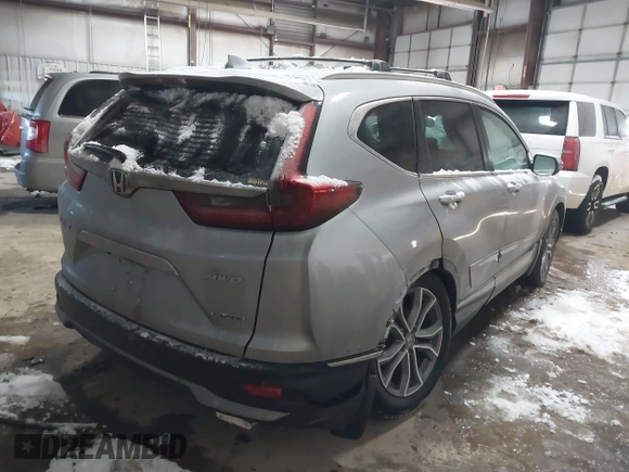 2020 Honda CR-V Touring with VIN 7FARW2H96LE000275, listed as a IAAI auction lot 41600759 with 78,078 mi miles and . Bid and sale history available at DreamBid. Image 4.