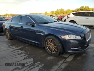 2015 Jaguar XJ with VIN SAJWA2GT2FMV90837, listed as a Copart auction lot 71126294 with 92,973 mi miles and Clean Title. Bid and sale history available at DreamBid. Image 4.