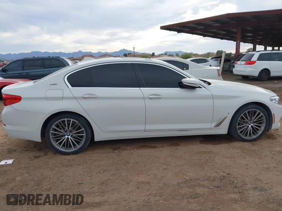 2018 BMW 5 Series 530e xDrive with VIN WBAJB1C55JB374652, listed as a IAAI auction lot 41812287 with 84,593 mi miles and . Bid and sale history available at carsss.com. Image 12.