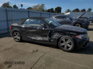 2009 BMW 1 Series 128i with VIN WBAUN13529VH81121, listed as a Copart auction lot 77849094 with 30,756 mi miles and Salvage Title. Bid and sale history available at DreamBid. Image 4.