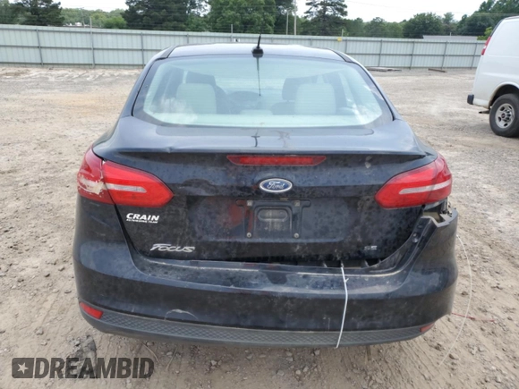 2018 Ford Focus SE z VIN 1FADP3F28JL319269, wystawiony jako Copart lot #59604555 z przebiegiem 167 726 mil mil oraz Szkoda całkowita • Salvage title. Historia ofert i sprzedaży dostępna na DreamBid. Obrazek 6.