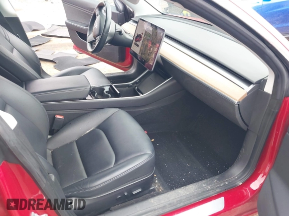 2018 Tesla Model 3 Long Range Battery with VIN 5YJ3E1EB3JF129772, listed as a IAAI auction lot 42017305 with 103,825 mi miles and . Bid and sale history available at DreamBid. Image 5.