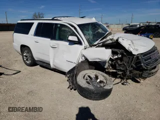 2015 GMC Yukon XL SLE z VIN 1GKS1GKC1FR643293, wystawiony jako Copart lot #82106544 z przebiegiem 164 623 mil mil oraz Szkoda całkowita • Salvage title. Historia ofert i sprzedaży dostępna na DreamBid. Obrazek 4.