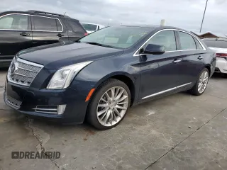 2013 Cadillac XTS Platinum z VIN 2G61U5S39D9205165, wystawiony jako Copart lot #74751524 z przebiegiem 100 203 mil mil oraz Szkoda całkowita • Salvage title. Historia ofert i sprzedaży dostępna na DreamBid. Obrazek 1.