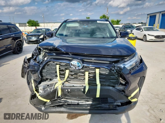 2022 Toyota RAV4 Hybrid XLE with VIN 2T3RWRFV0NW138427, listed as a Copart auction lot 60860815 with 27,772 mi miles and Salvage title. Bid and sale history available at DreamBid. Image 5.