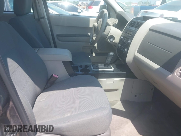 2009 Ford Escape XLS z VIN 1FMCU02729KC33600, wystawiony jako IAAI lot #42469557 z przebiegiem 185 605 mil mil oraz . Historia ofert i sprzedaży dostępna na DreamBid. Obrazek 5.
