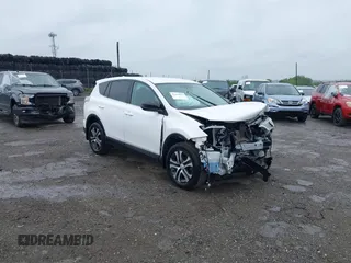 2018 Toyota RAV4 LE with VIN 2T3BFREV7JW851015, listed as a IAAI auction lot 42354042 with 94,603 mi miles and . Bid and sale history available at DreamBid. Image 1.